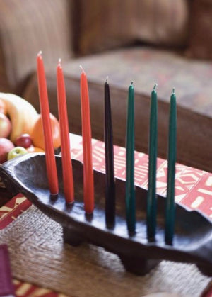 Embrace the spirit of Kwanzaa (Nguzo Saba) with these dripless red, black, and green Kwanzaa candles for your family's celebration. As a bonus, enjoy a free 60-page digital download containing the holiday's history, recipes, and gift ideas.