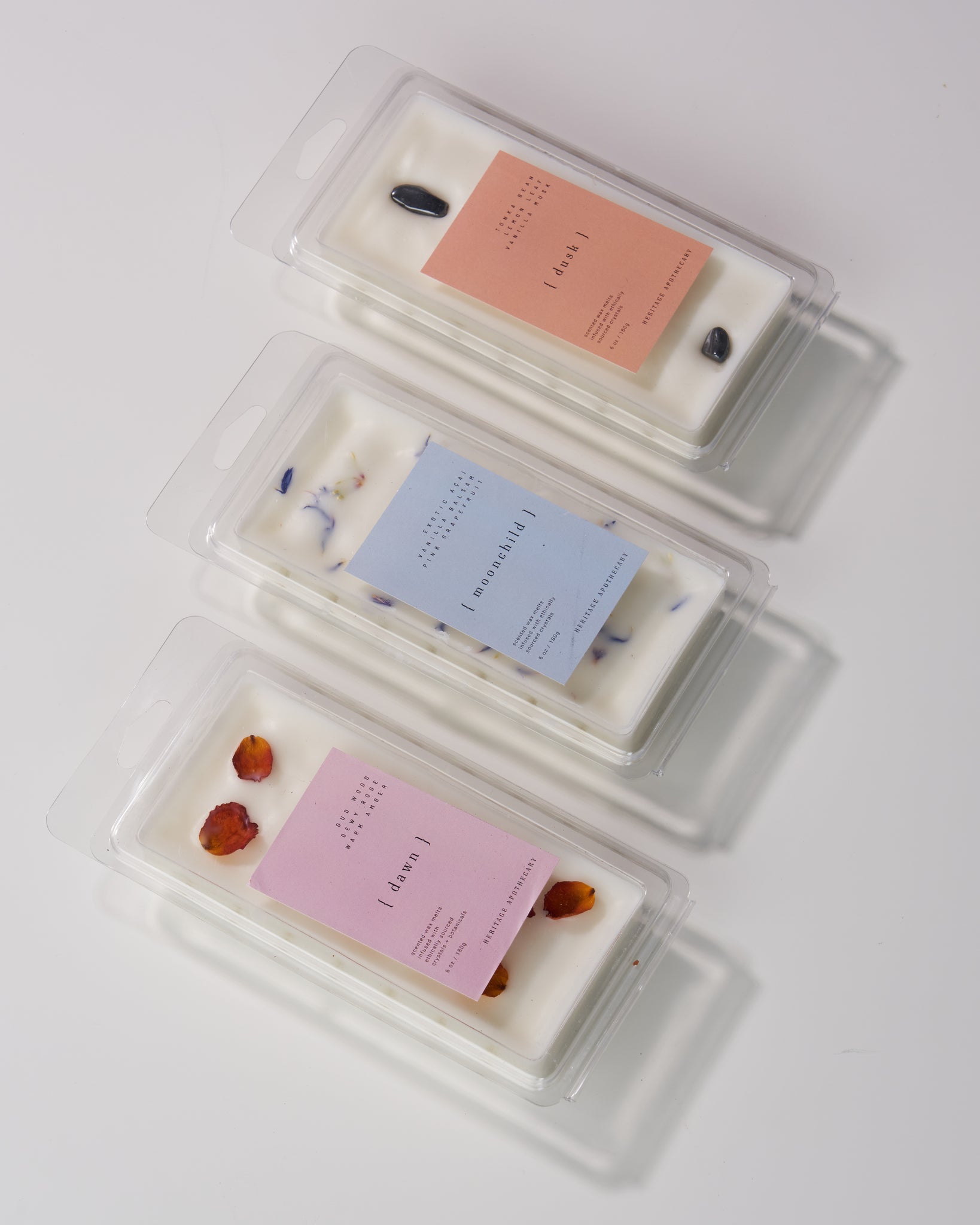 Discovery set of handcrafted coconut and soy wax melts featuring Dusk, Dawn, and Moonchild scents. Elevate your home's ambiance with these luxurious fragrances.