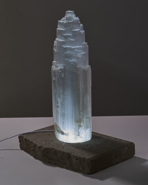 Transform your space with Selenite tower lamp. Cleanses and illuminates. Included: One 14” Selenite lamp with LED light.