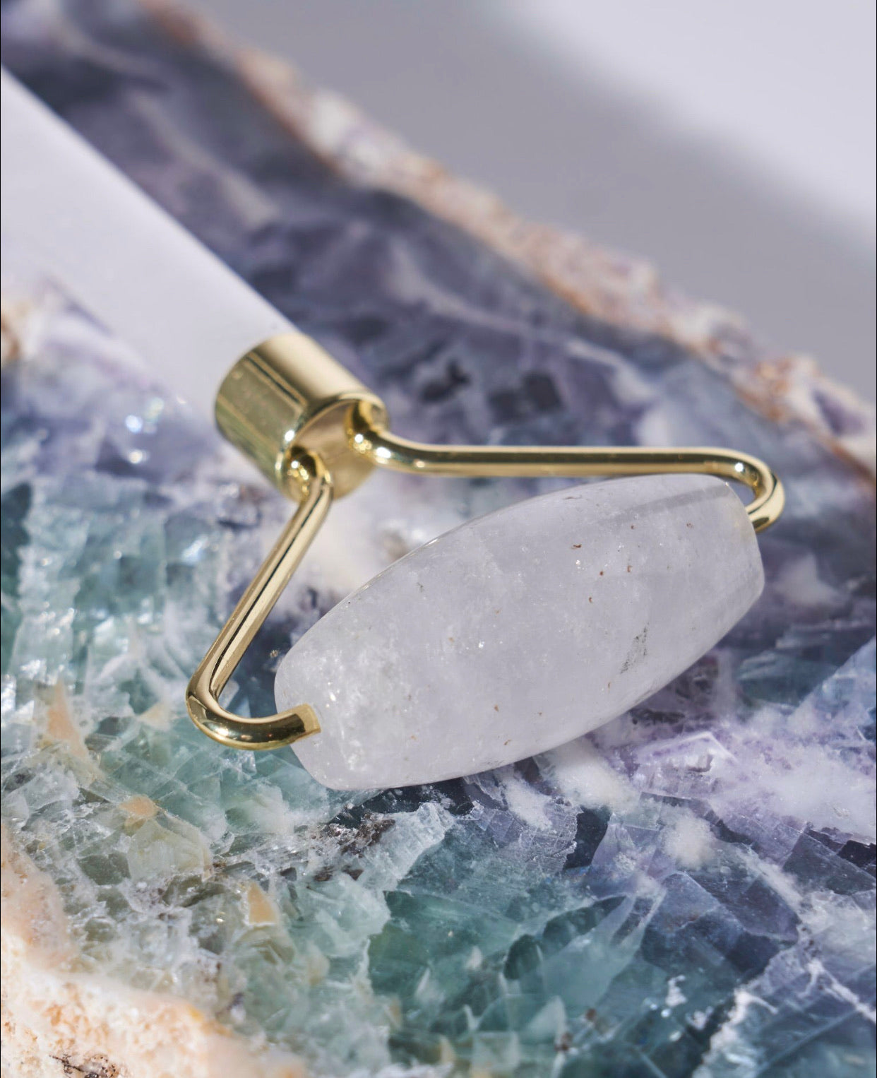 Crystal Quartz Precious Stone Facial Massager: Experience the pure and soothing energy of crystal quartz with our facial massager. Boost circulation, tone your skin, and rejuvenate on a cellular level. Elevate your skincare routine with the power of crystal quartz