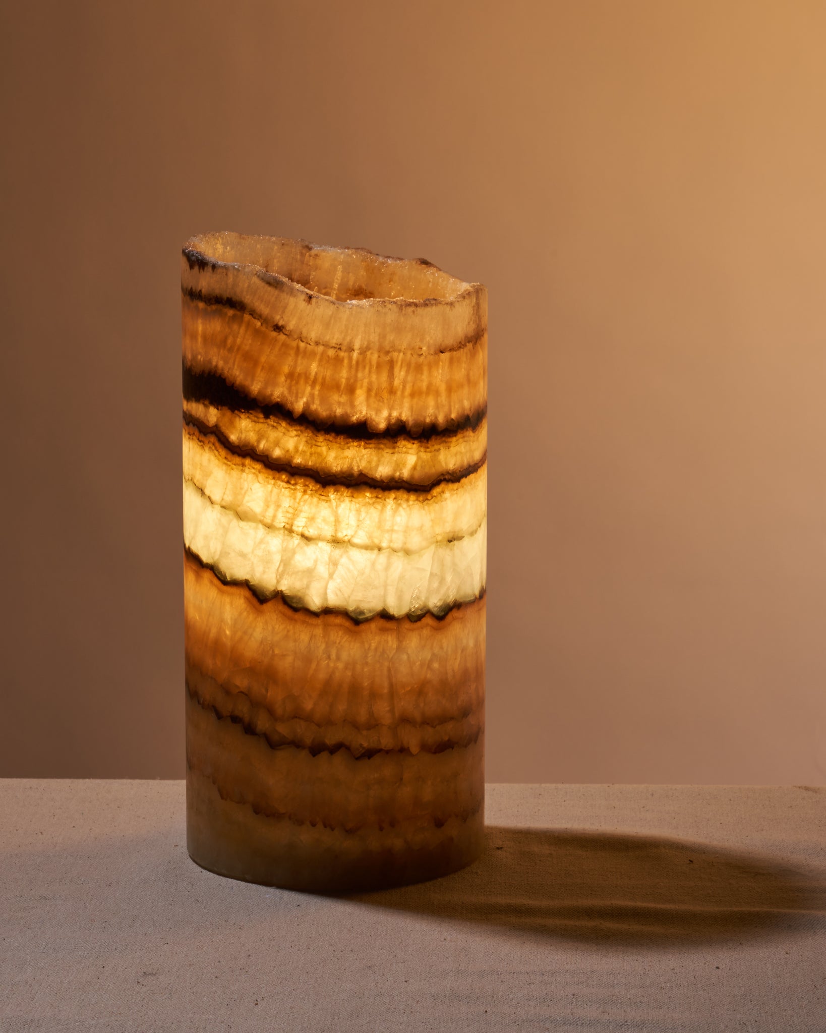 Illuminate your space with Mexican Onyx lamp's protective vibes. Ideal for decor and gifting. Included: One polished, cut base Mexican Onyx lamp.