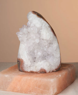 Enhance your space with Quartz lamp, known for energy conductivity and intention amplification. A protective stone that harmonizes spaces, guards against negativity, and aids spiritual growth. Perfect for home or office decor and gifting. Included: One polished, cut base Quartz lamp with LED light. Measurements: Height 6-9”, Length 4-6”, Base 3-4”, 6-8lb. Natural stone variations may occur