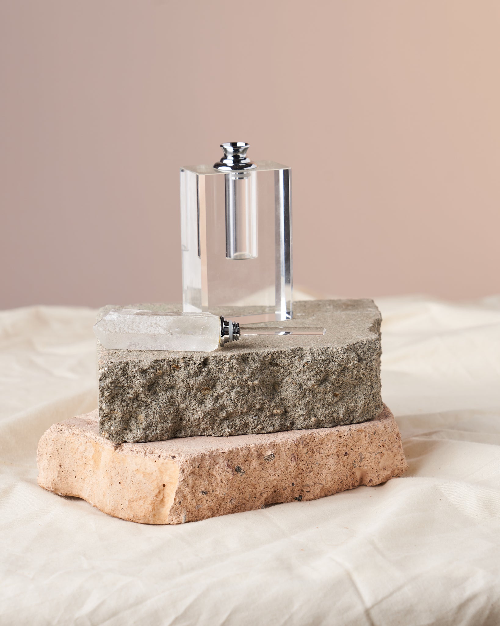 Master Quartz Bottle - Clear Quartz-Embellished Perfume & Essential Oil Container: Transform your aromatherapy with this elegant 6-inch tall, 4-inch diameter bottle. Clear quartz, the 'master stone,' magnifies energy. An exquisite gift option. Compact yet stylish design with 1 dram (5ml) oil capacity