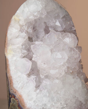 Elevate your ambiance with Quartz lamp – a conductor of energy and intention amplification. Ideal for enhancing spaces, shielding against negativity, and nurturing spiritual growth. Includes: One polished, cut base Quartz lamp with LED light. Dimensions: Height 6-9”, Length 4-6”, Base 3-4”, 6-8lb. Natural stone variations may apply.