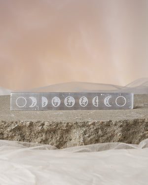 Sleek Selenite Charging Plate with Hand-Etched Moon Phases - Approximately 7x2 Inches - Ideal for Displaying Crystals and Charging Jewelry - Promotes Auric Atmosphere Clearing and Connection to Higher Consciousness - Hand-Cut Natural Stone